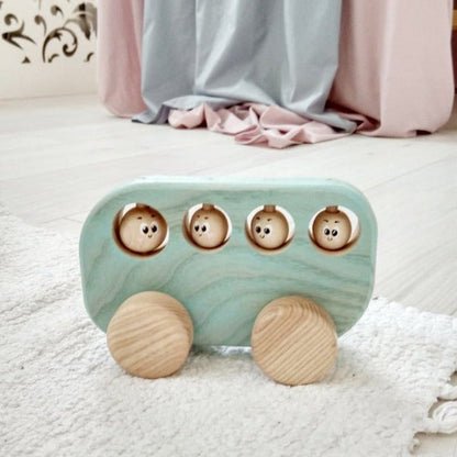 Bus jouet en bois